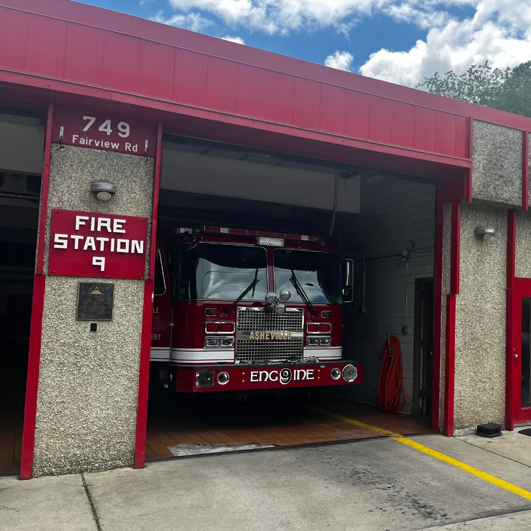 The existing Fire Station 9, 749 Fairview Road, with Engine 9 in the open bay (City alt text: "Open bay doors and engine in Fire station 9")