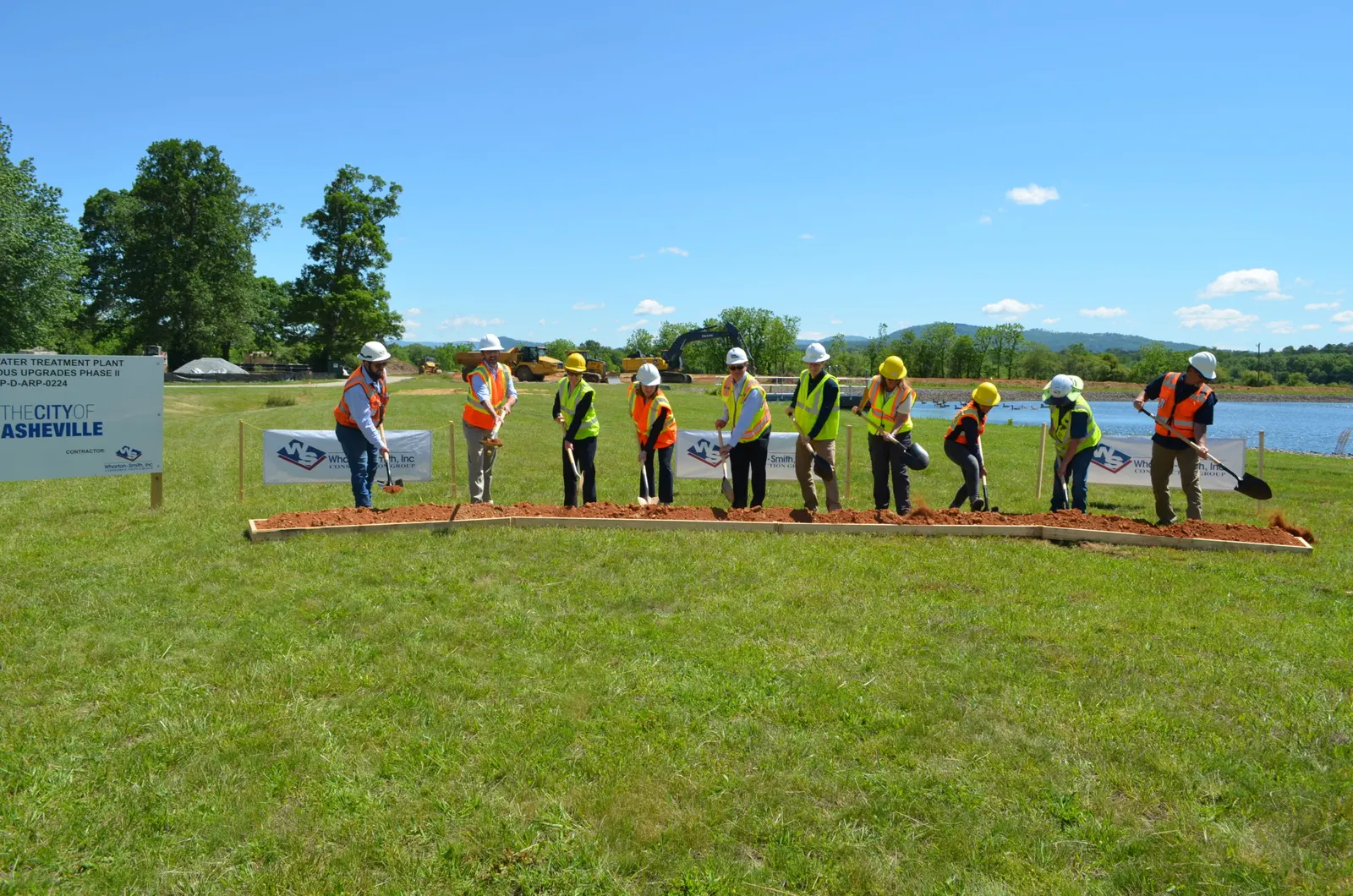 Staff, elected officials and partners break ground for Phase 2 upgrades at the Mills River Water Treatment Plant (City caption), May 23, 202